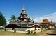 Thailand: The distinctive Burmese-style pyatthat (multi-tiered and spired roof) of the viharn at Wat Hua Wiang (the modern ubosot in the background), Mae Hong Son, northern Thailand